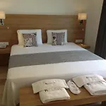 Отель Rhapsody